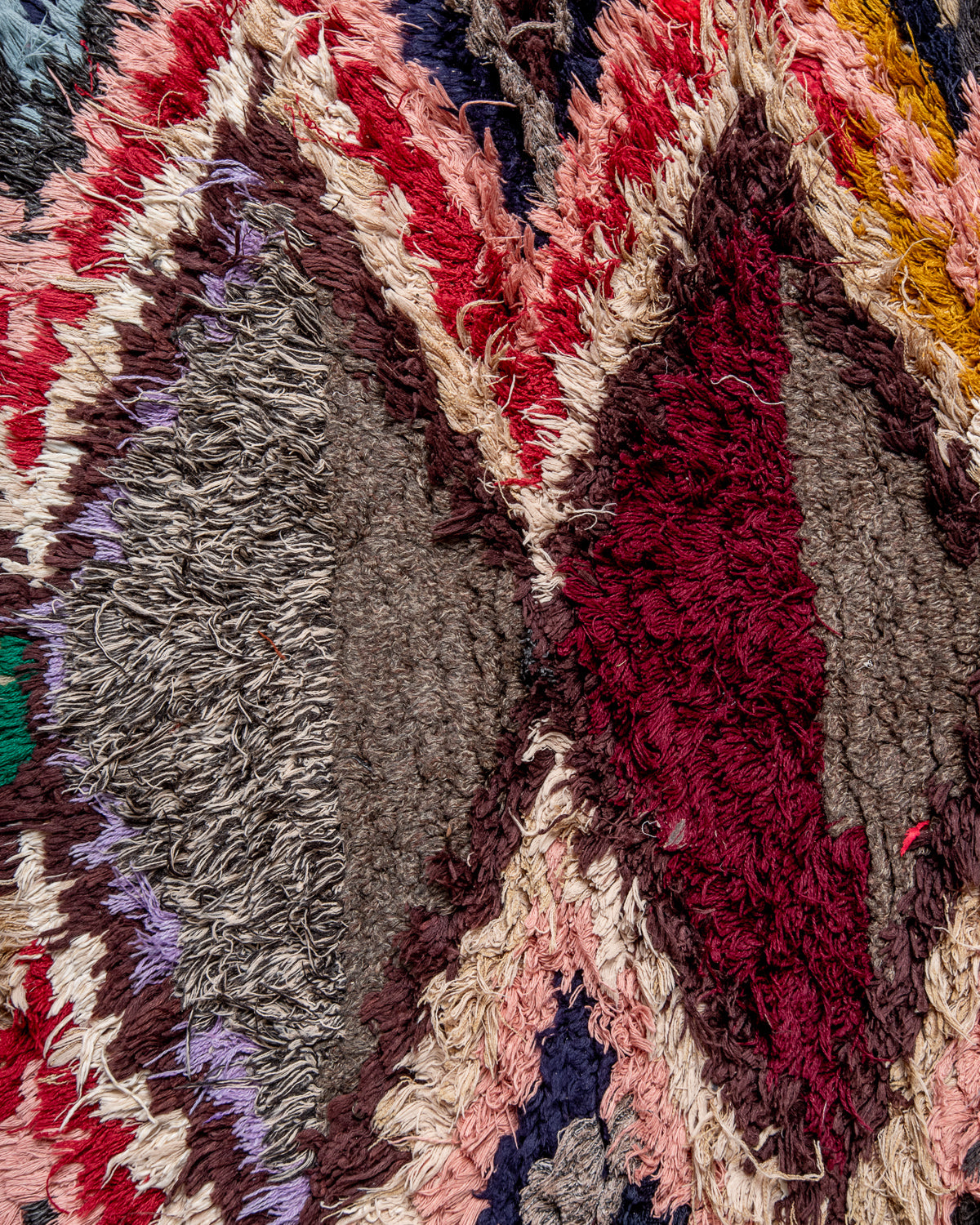 Modern designer vintage handcrafted Berber rug from Morocco. Boucherouite runner rug with beautiful colors and patterns.